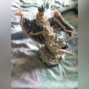 Plays White Christmas 
Winter wizard and fairy music box.